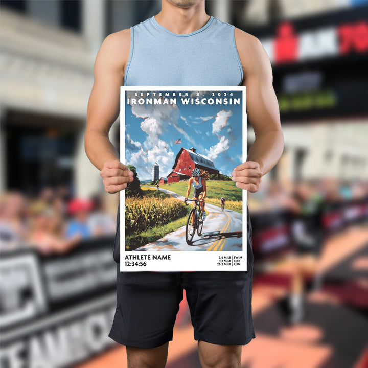 This poster of Ironman Wisconsin depicts a triathlete cycling down a classic Wisconsin road. The Ironman Wisconsin poster is personalized with athlete name, finish time and 140.6 distances. The best gift for an Ironman Triathlete