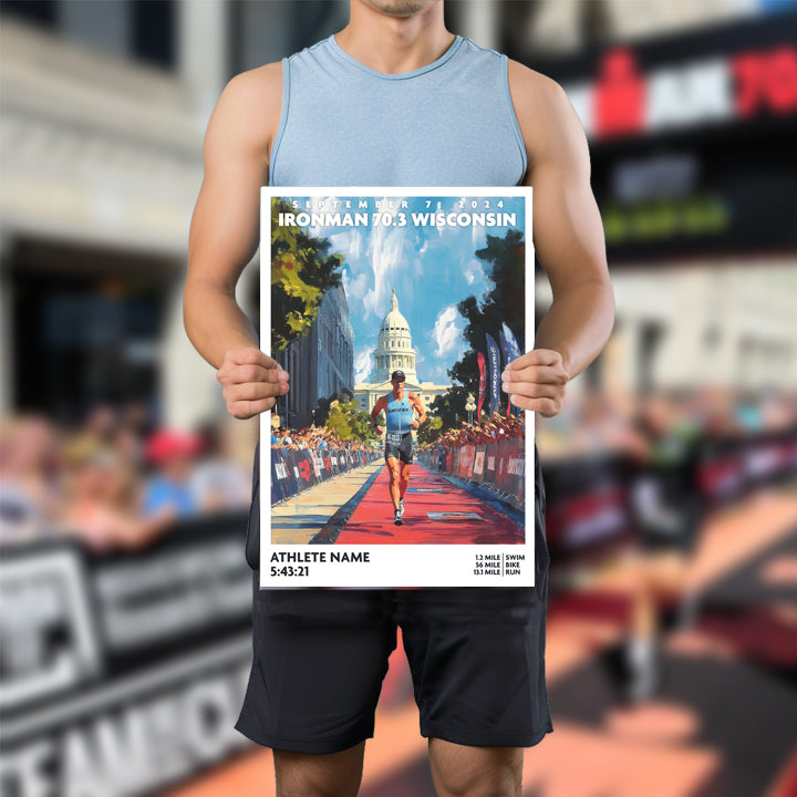 poster of Ironman 70.3 Wisconsin depicts a male triathlete running down the finishing chute just before completing the race. The Ironman Wisconsin poster is personalized with athlete name, finish time and 70.3 distances.