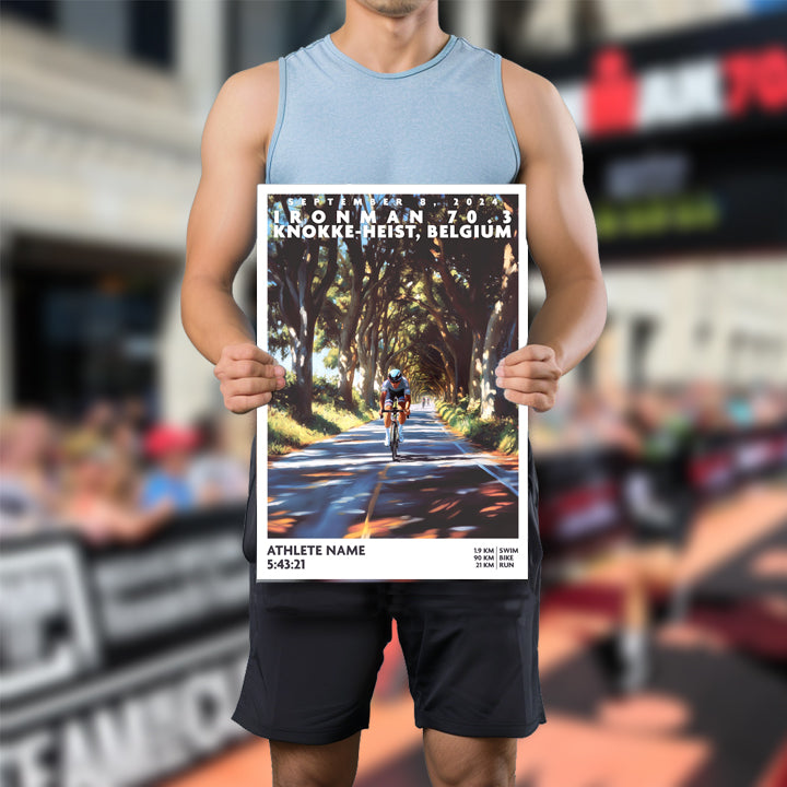 poster of Ironman 70.3 Knokke-Heist, Belgium depicts a triathlete cycling beneath a canopy of trees. The Ironman 70.3 Knokke-Heist poster is personalized with athlete name, finish time and 70.3 distances.