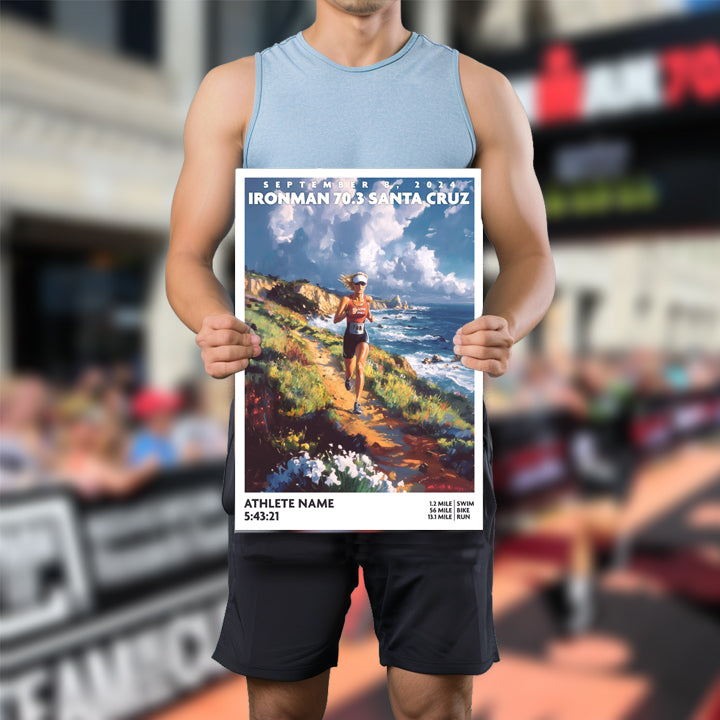 poster of Ironman 70.3 Santa Cruz depicts a triathlete running along a trail by the coast. The Ironman Santa Cruz  poster is personalized with athlete name, finish time and 70.3 distances.