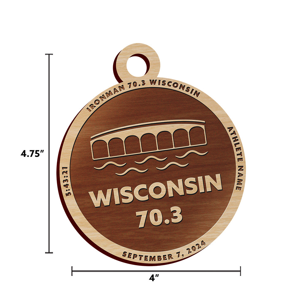 Ironman 70.3 Wisconsin Christmas ornament. The ornament is laser engraved and personalized with the athletes name and finish time.